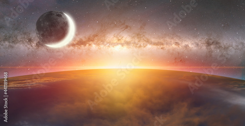 Planet Earth in front of the Milky Way galaxy with crescent moon"Elements of this image furnished by NASA "