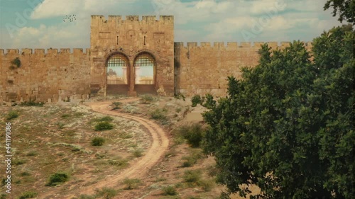 Representation of the old Golden Gate and ancient city of Jerusalem with Second Temple. Israel in the time of Christ. photo