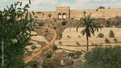 Representation of the old Golden Gate and ancient city of Jerusalem with Second Temple. Israel in the time of Christ. photo