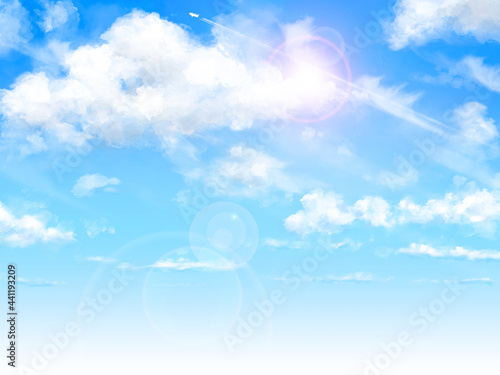 夏の青空と雲と飛行機雲