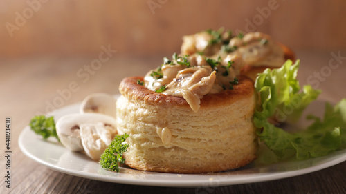 Fototapeta Naklejka Na Ścianę i Meble -  vol au vent- puff pastry with cream and mushroom