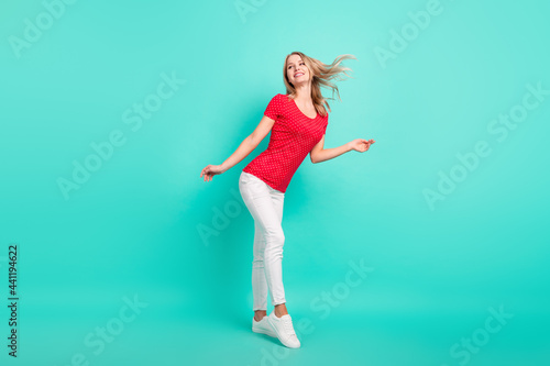 Fototapeta Naklejka Na Ścianę i Meble -  Full body profile side photo of young woman happy positive smile dream think look empty space isolated over teal color background