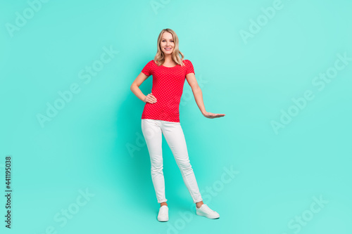 Full length body size photo woman showing small size in casual clothes isolated bright teal color background