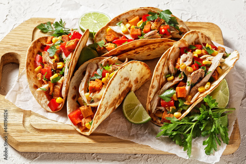 tacos with grilled chicken meat and veggies