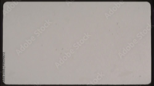 Real film frame from a 8 mm camera for overlay on your footage. Dirt, grain and scratches to add an analog touch. Authentic 80s era home movie camera.