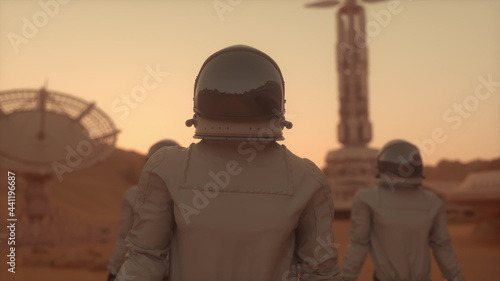 Three Astronauts in Space Suits Confidently Walking on Mars. Mars Colonization Concept. 3d rendering