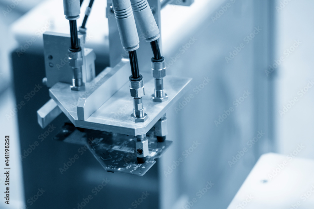 The hi-technology material handling circuit board parts production line by robotic system. The automatic pneumatic robotic arm picking the computer parts in production line. The hi-technology material handling circuit board parts production line by robotic system. The automatic pneumatic robotic arm picking the computer parts in production line.