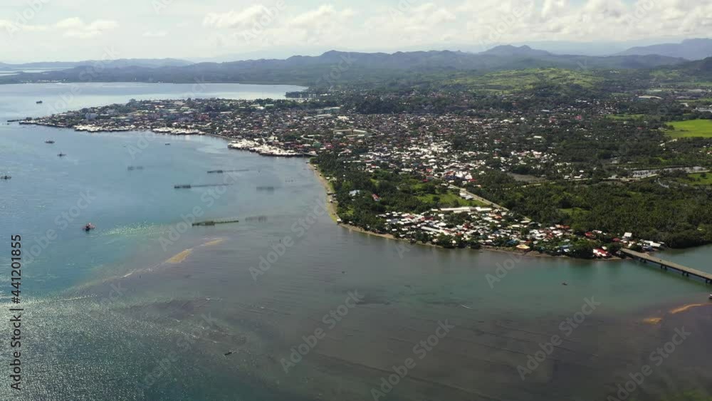 Top view of Surigao City on Mindanao island, Philippines. A developing and modern city in Asia. Surigao del Norte. Top view of Surigao City on Mindanao island, Philippines. A developing and modern city in Asia. Surigao del Norte.
