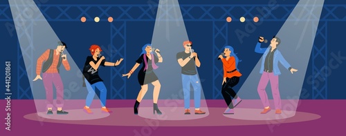 Young singers with microphones sing songs on stage at karaoke party or music show