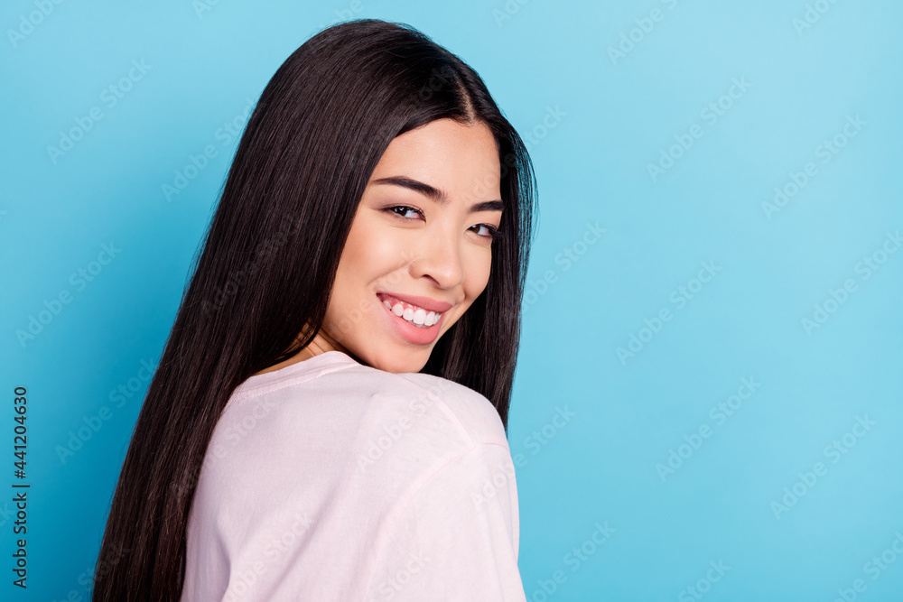 Profile portrait of gorgeous satisfied person toothy smile look camera isolated on pastel blue color background Profile portrait of gorgeous satisfied person toothy smile look camera isolated on pastel blue color background