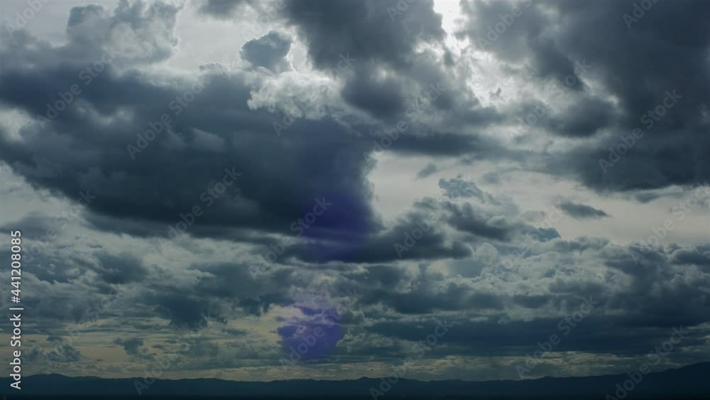 Time-lapse of cloud stormy black background and dramatic thunderstorm clouds with the rain Time-lapse of cloud stormy black background and dramatic thunderstorm clouds with the rain