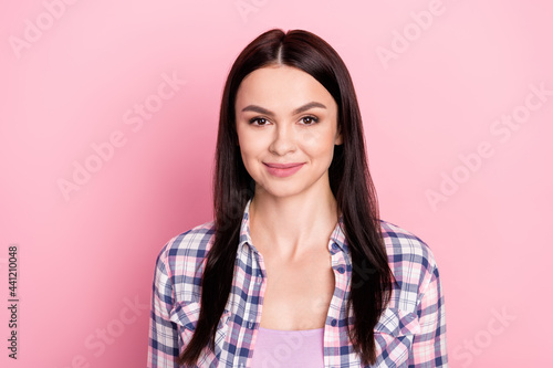 Photo of charming pretty young lady dressed checkered shirt smiling isolated pink color background