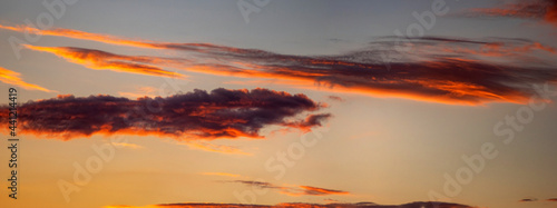 Beautiful colorful orange clouds at sunset, beautiful summer landscape in the evening