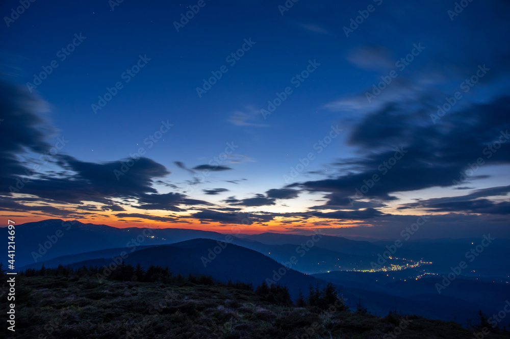 Beautiful multicolored sunrise in the Carpathian mountains in summer. Morning landscape