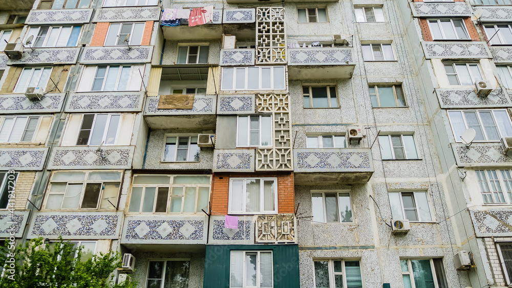 Colorful facade of a Soviet-built house. Derbent, Dagestan, Russia