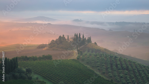 Tuscany Sunrise. Image of iconic Tuscany landscape during foggy autumn sunrise.