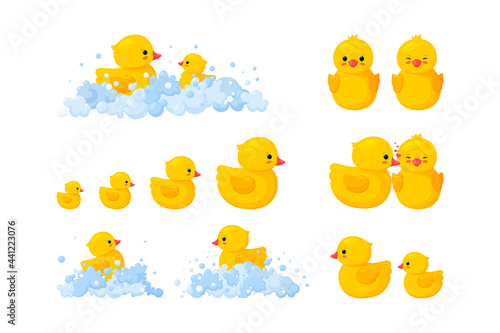 Rubber duck family in soap foam isolated in white background. Big set of yellow plastic duck toys in suds, parent and baby. Vector illustration in cartoon style