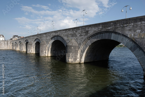 The 16 metres long arched stone footbridge Sint Servaasbrug (or the St. Servatius Bridge) across the Meuse river in Maastricht, Netherlands