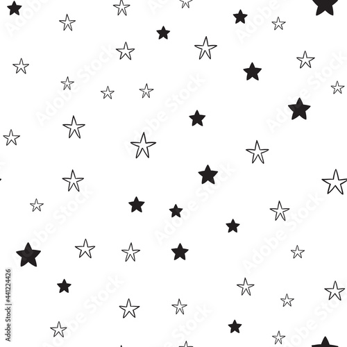 Star doodles seamless pattern. Hand drawn stars illustrations, background texture. Monochromatic. © Matias