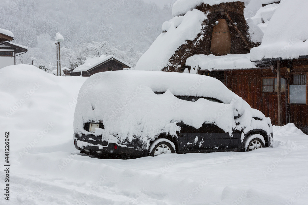 Snow covered car