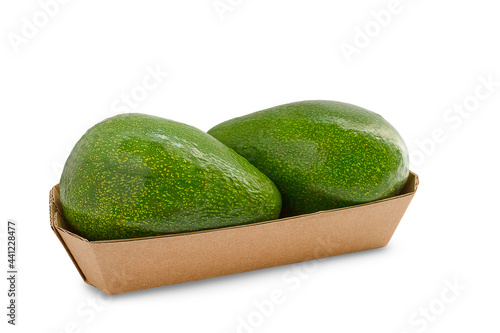 two avocadas in a cardboard bowl on a white background, avocado isolate