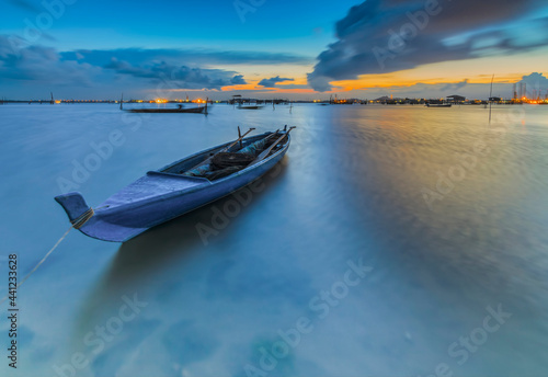 boats at sunset