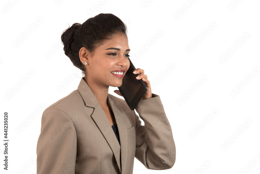happy business woman talking on the mobile phone or smartphone isolated on white background happy business woman talking on the mobile phone or smartphone isolated on white background