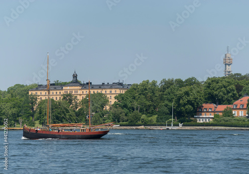 Old sailing ship passing the island Djurgården in Stockholm