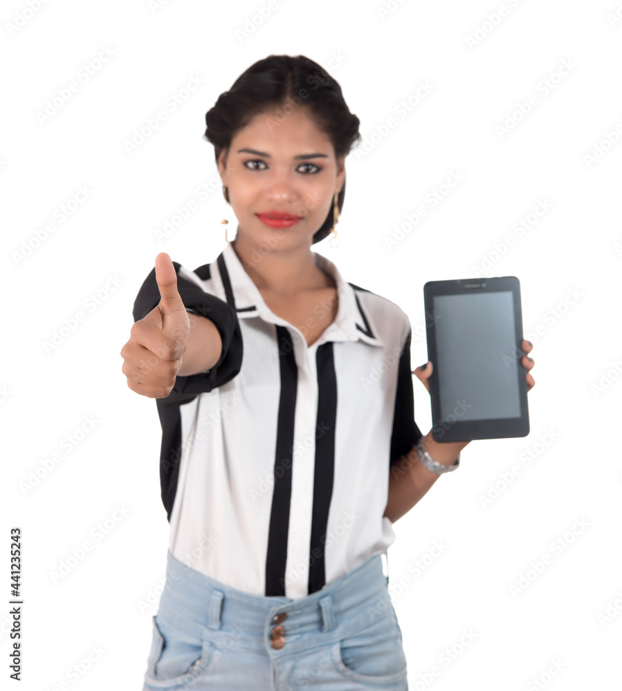 Young beautiful woman holding blank screen smart phone on white background Young beautiful woman holding blank screen smart phone on white background