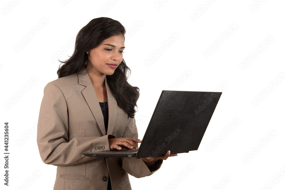 Young happy smiling woman holding laptop. Young happy smiling woman holding laptop.