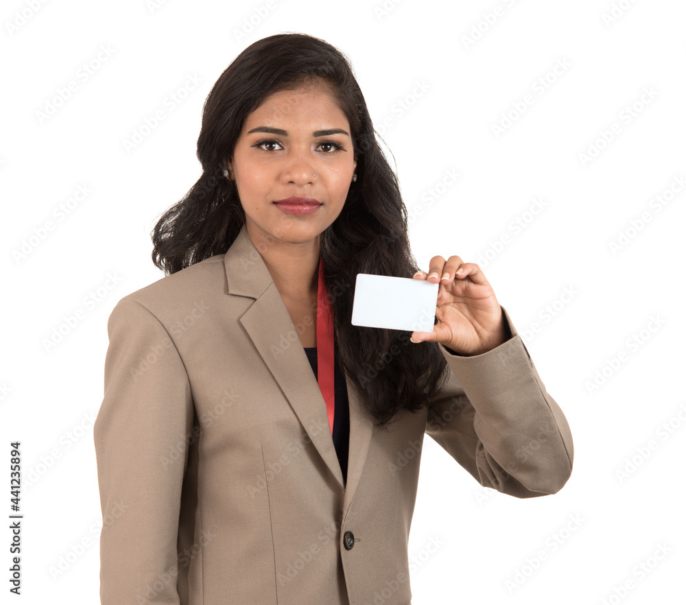 Smiling business woman holding a blank business card or ID card over white background Smiling business woman holding a blank business card or ID card over white background