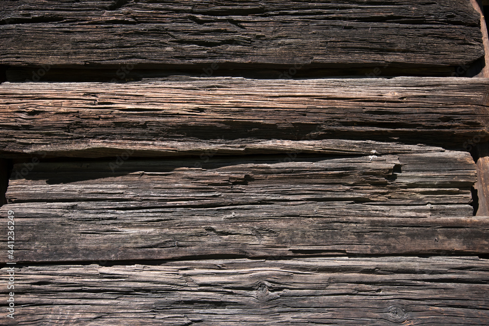 Logs of an old log house wall in Stockholm Logs of an old log house wall in Stockholm