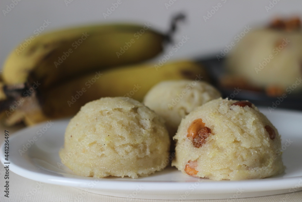 Semolina banana pudding. A fluffy Indian pudding made of Semolina, ghee, sugar, bananas and garnished with cashews. Locally known as banana sheera.