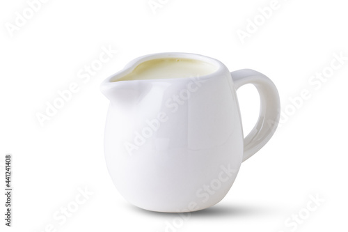 full jug of milk isolated on white background