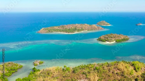 Tropical island with sandy beach on the Zamboanga Peninsula. Sallangan Islands, Simoadang Island. Mindanao, Philippines. photo