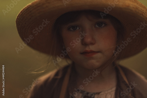 a girl in a hat 