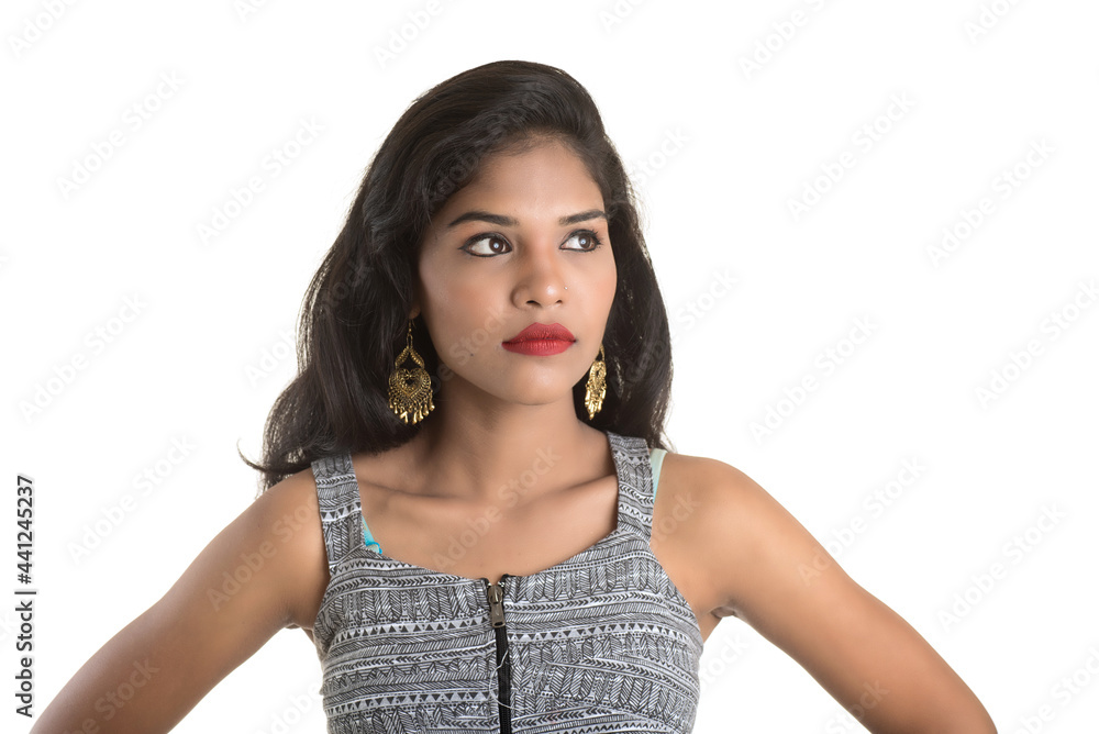 Portrait of beautiful young smiling girl posing on white background Portrait of beautiful young smiling girl posing on white background