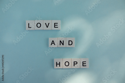 Words Have Power word cube on wood background ,English language learning concept love and hope