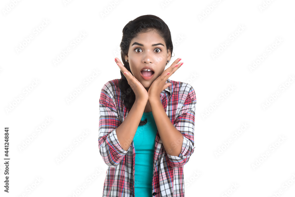 Beautiful girl surprised and shocked. Expressive facial expressions Beautiful girl surprised and shocked. Expressive facial expressions