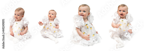 A one-year-old girl with blonde hair and blue eyes. In a white airy dress and white tights. Different shooting angles. Full-length. Different emotions. On a white background.