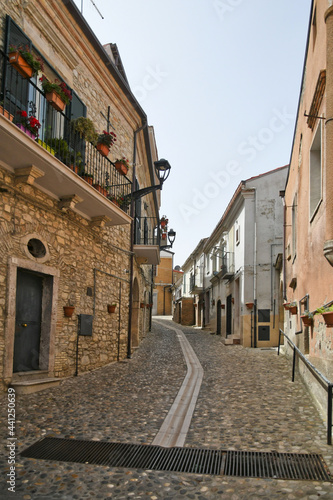A small street between the old houses of Deliceto  a medieval village in the mountains of the Pugliaregion.