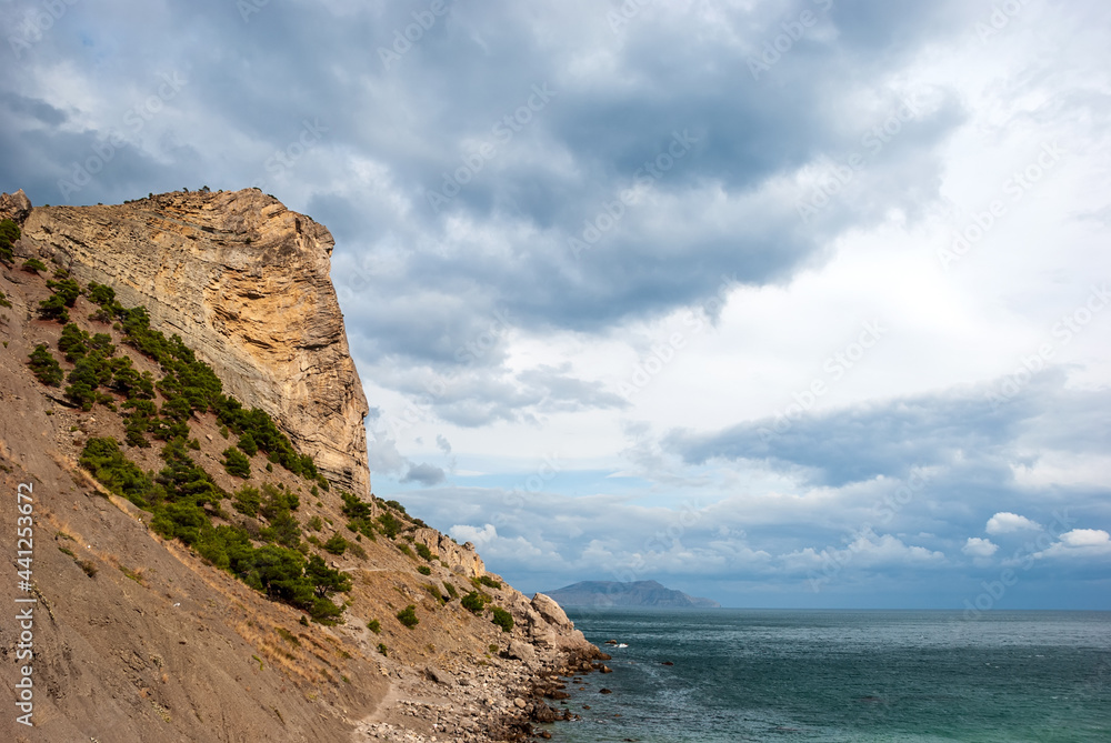 Beautiful seascape of the Crimean peninsula. Black sea from the mountain on a sunny day.