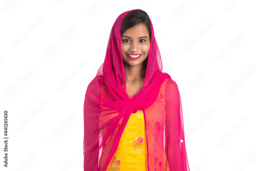 Beautiful Indian traditional girl posing on white background. Beautiful Indian traditional girl posing on white background.