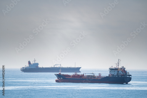 Cargo ships outside of a port