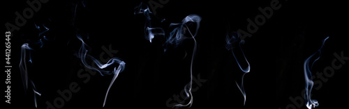 Smoke abstract set. Blur white smoke, abstract fog or steam mist cloud group isolated on black background. For overlay in pollution, vapor cigarette, gas, dry ice.