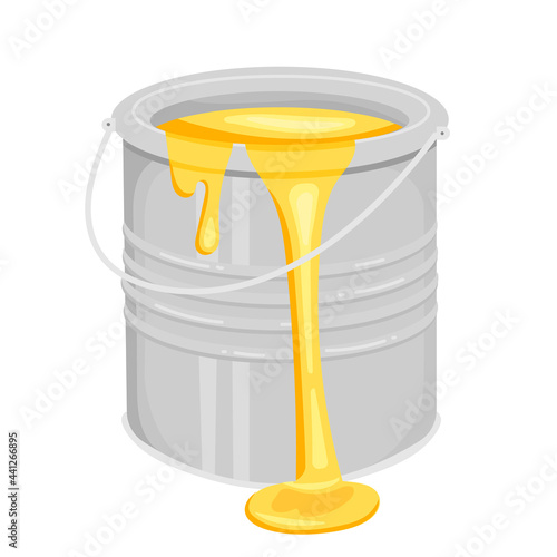 tin can with yellow paint and liquid drops. iron bucket with paint for repair