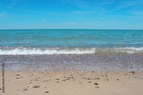 Seascape. Azure sea water. Sandy Baltic coast.