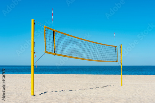 Beach volleyball court with an ocean background. Summer sport concept