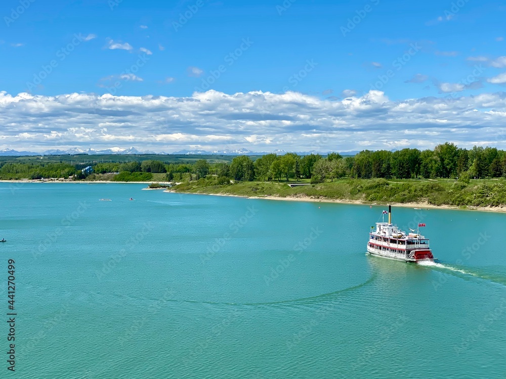 Fototapeta premium Rustic paddlewheel boat on the Glenmore Reservoir in Calgary Alberta