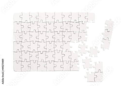 Blank rectangular jigsaw puzzle mockup isolated on white background photo